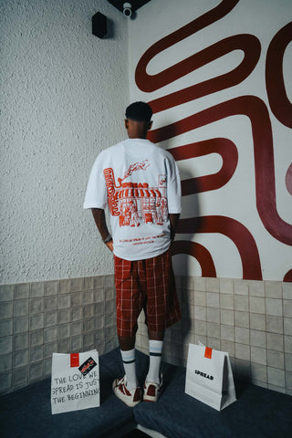 NAQEES X SPREAD  LMTD. TEE