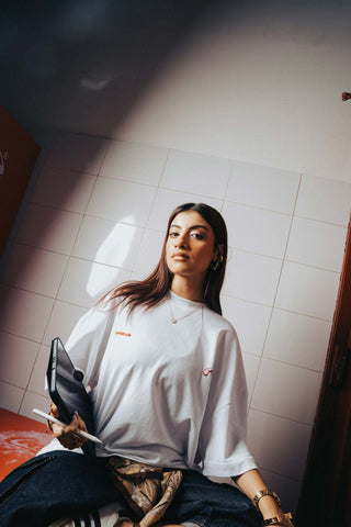 NAQEES X SPREAD  LMTD. TEE