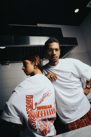 NAQEES X SPREAD  LMTD. TEE