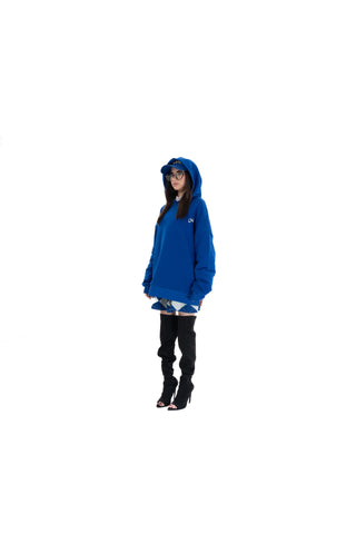 Person wearing a blue hoodie on a white background