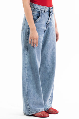 Light wash Nakam Howe wide leg jeans from the KKP collection by Naqees, worn — Pakistani streetwear