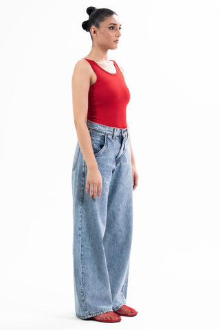 Light wash Nakam Howe wide leg jeans from the KKP collection by Naqees, worn — Pakistani streetwear