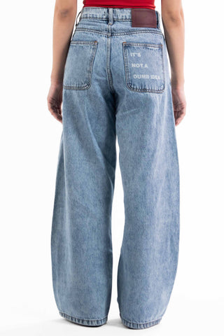 Light wash Nakam Howe wide leg jeans from the KKP collection by Naqees, worn — Pakistani streetwear