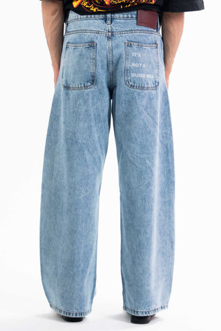 Light wash Nakam Howe wide leg jeans from the KKP collection by Naqees, worn — Pakistani streetwear