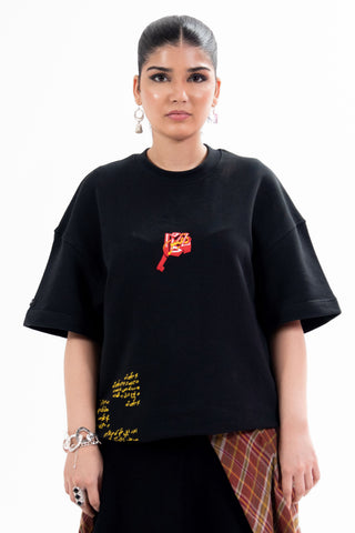 Black Wakeup Call tee from the KKP collection by Naqees, worn — Pakistani streetwear