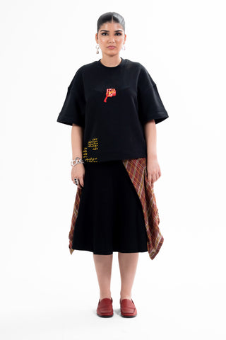 Black Wakeup Call tee from the KKP collection by Naqees, worn — Pakistani streetwear