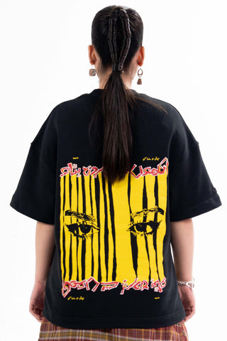 Black Wakeup Call tee from the KKP collection by Naqees, worn — Pakistani streetwear