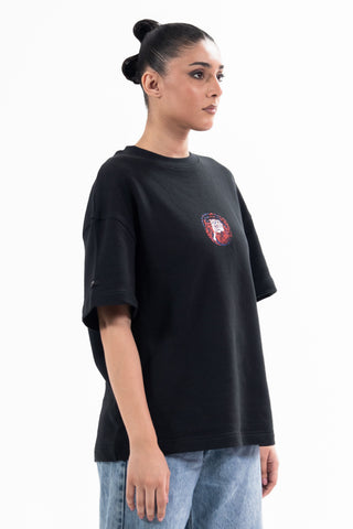 Black Sach Or Jhoot tee from the KKP collection by Naqees, worn — Pakistani streetwear
