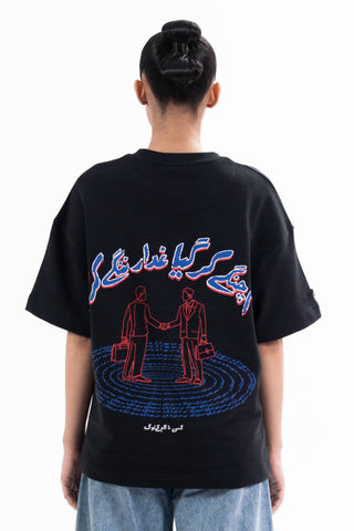 Black Sach Or Jhoot tee from the KKP collection by Naqees, worn — Pakistani streetwear