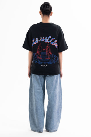 Light wash Nakam Howe wide leg jeans from the KKP collection by Naqees, worn — Pakistani streetwear