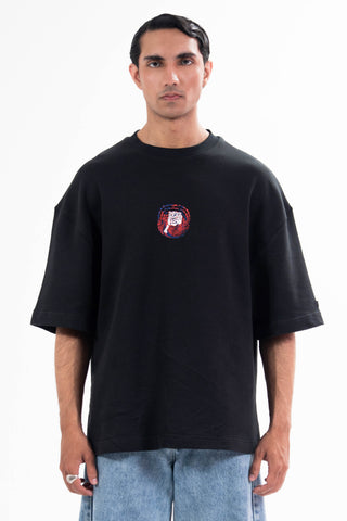 Black Sach Or Jhoot tee from the KKP collection by Naqees, worn — Pakistani streetwear