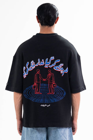 Black Sach Or Jhoot tee from the KKP collection by Naqees, worn — Pakistani streetwear