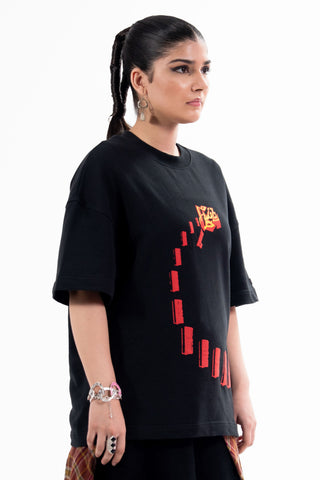 Black Nakam Darwazay tee from the KKP collection by Naqees, worn — Pakistani streetwear