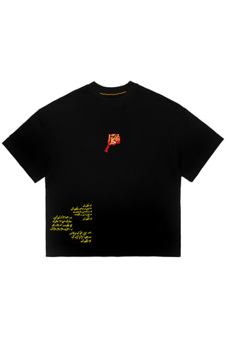 Black Wakeup Call tee with yellow bars and eyes print and Urdu verse by Naqees, flat lay — Pakistani streetwear