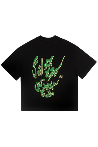 Black Parday Main Rehne Do tee with green curtain and halftone portrait print by Naqees, flat lay — Pakistani streetwear