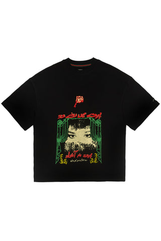 Black Parday Main Rehne Do tee with green curtain and halftone portrait print by Naqees, flat lay — Pakistani streetwear